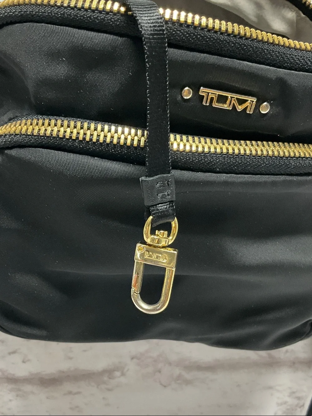 Tumi Black Nylon Crossbody with Gold Hardware Accents